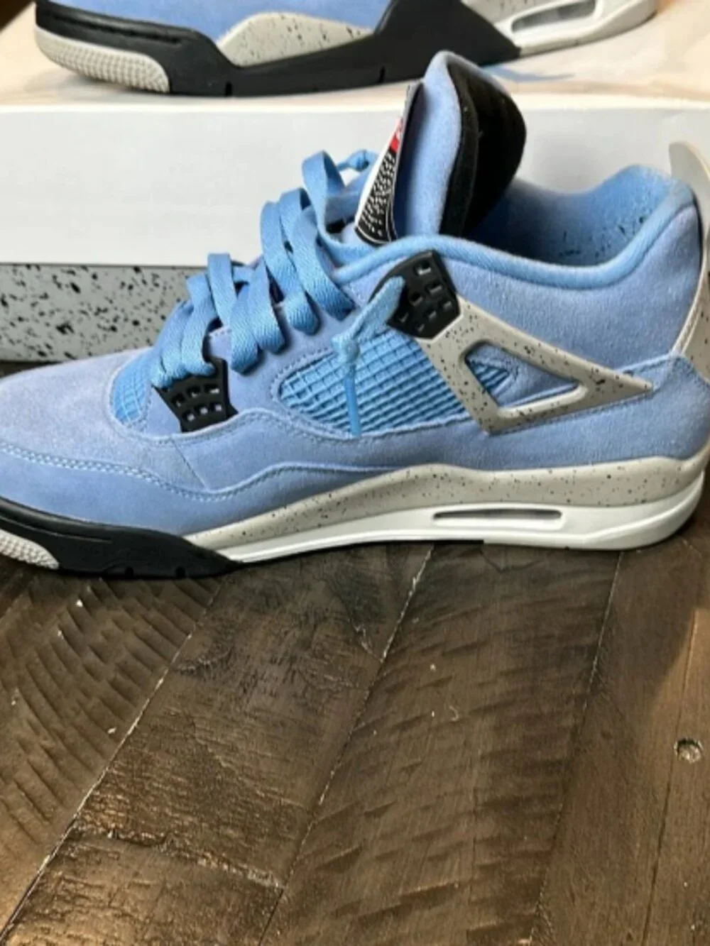 Jordan 4 Retro University Blue Sneakers